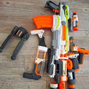 Nerf Modulus, orange, lime green, white and gray.